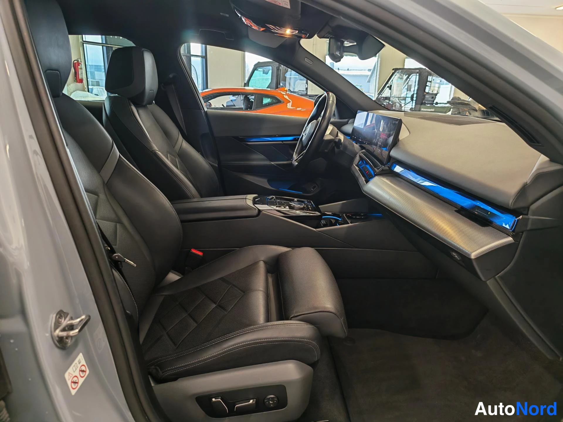 Grey BMW i5 2024, cockpit, photo 13
