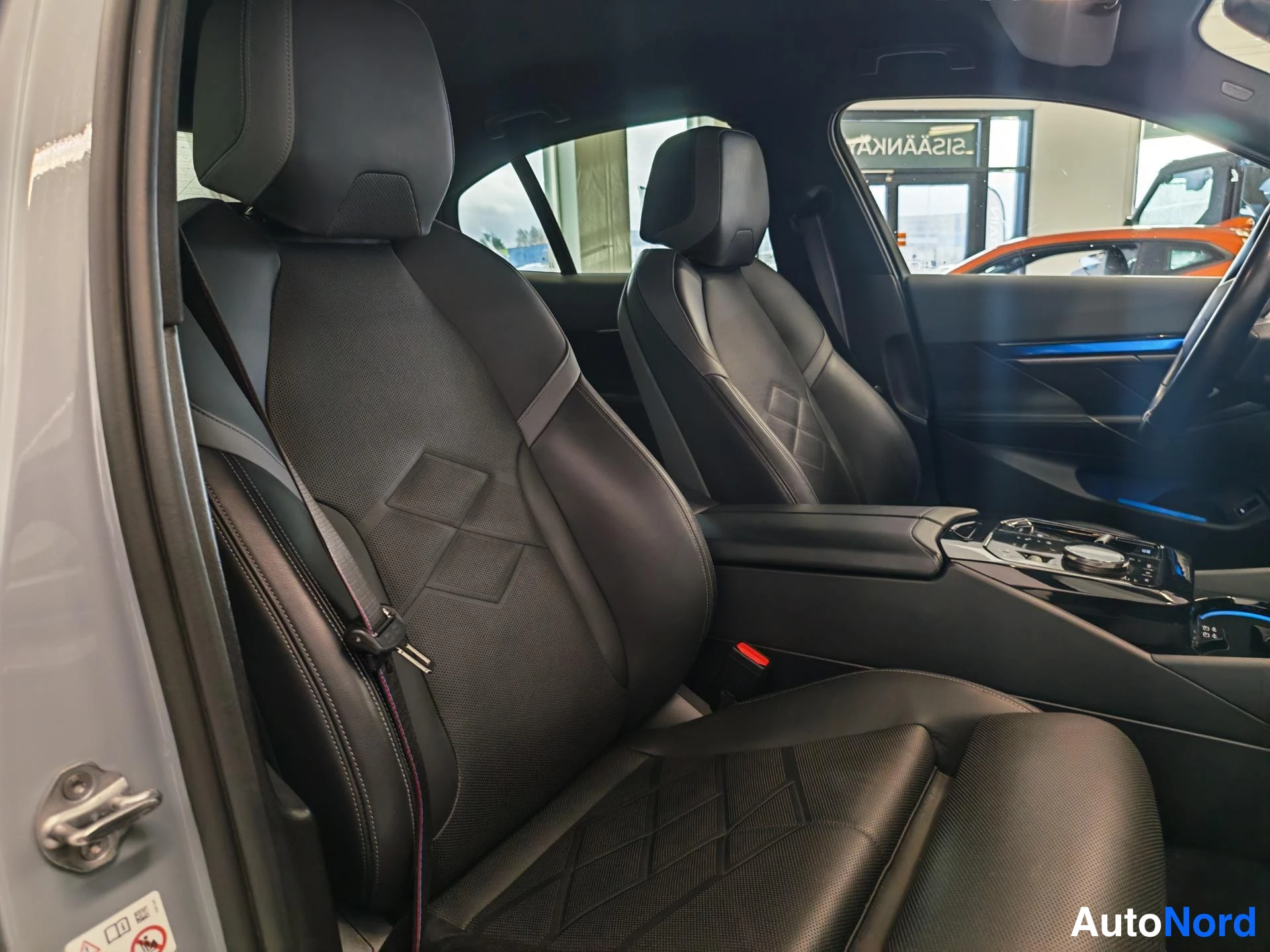 Grey BMW i5 2024, front seats, photo 14