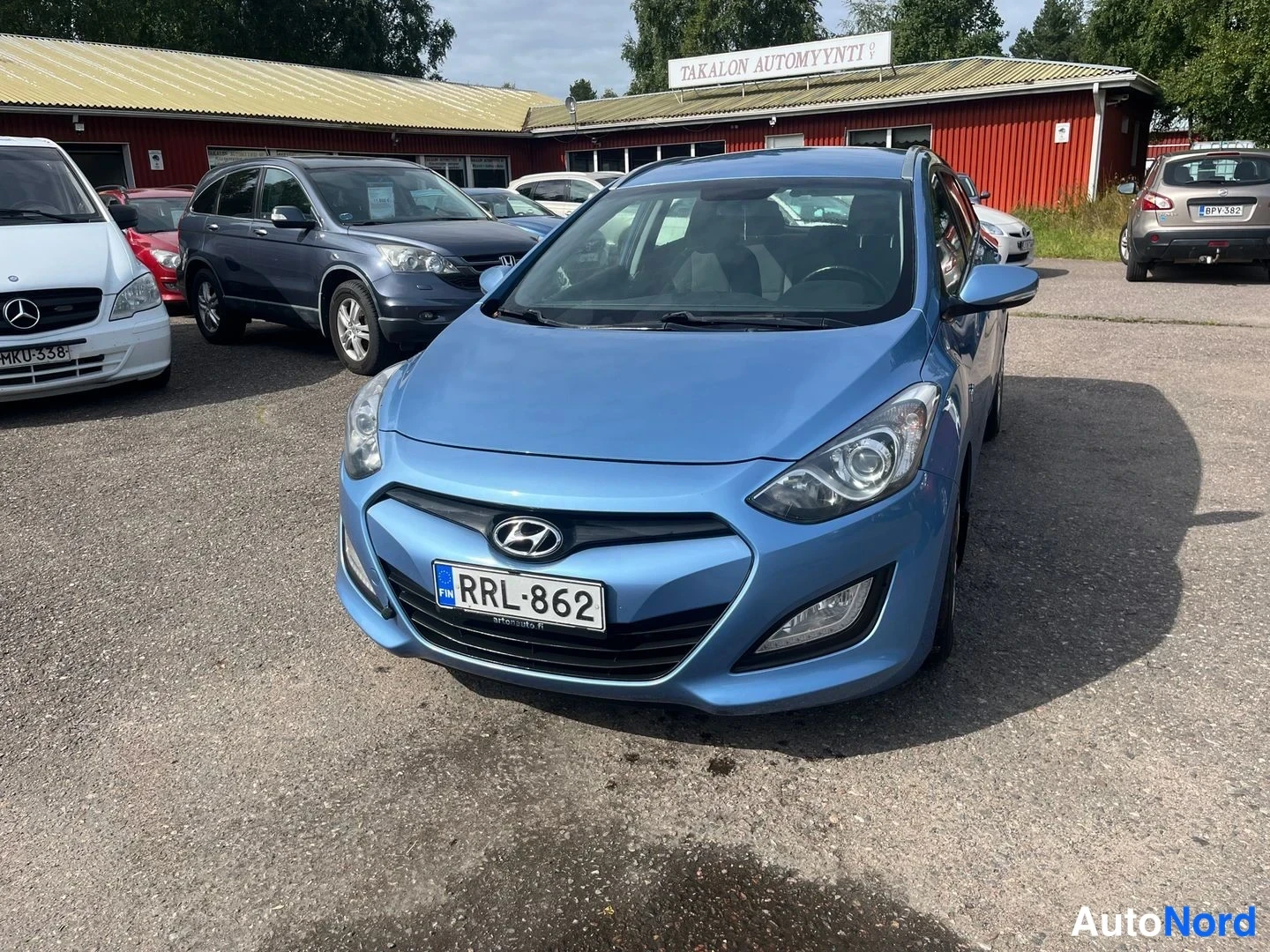 Sininen Hyundai i30 2013, edestä, kuva 3
