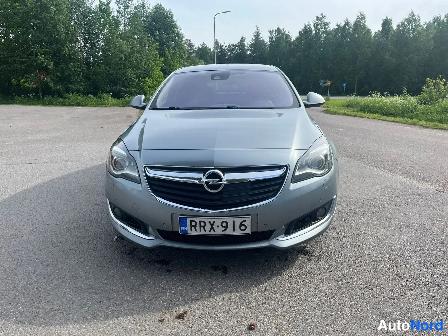 Sininen Opel Insignia 2014, edestä, kuva 3