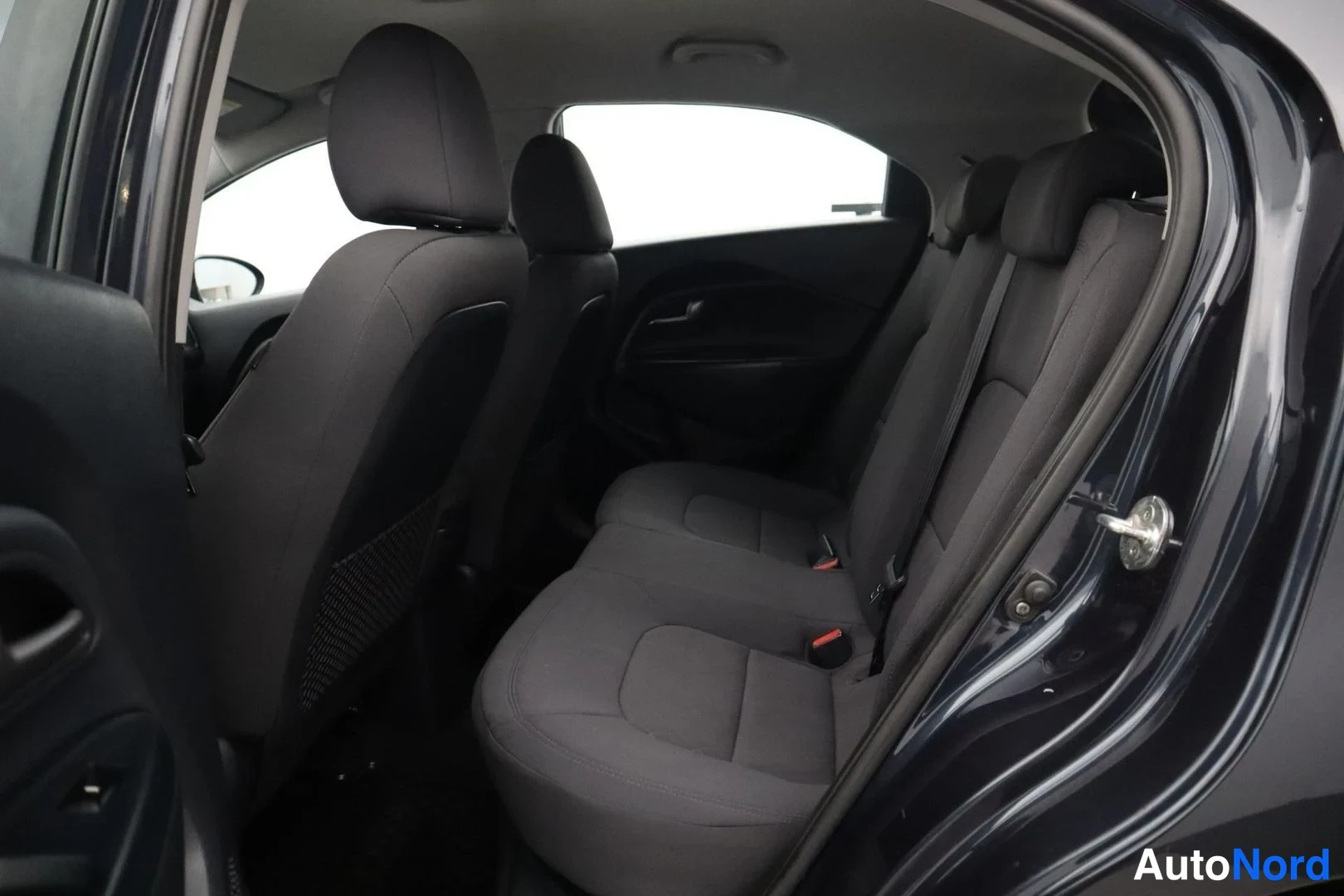 Blue Kia Rio 2015, rear seats, photo 15