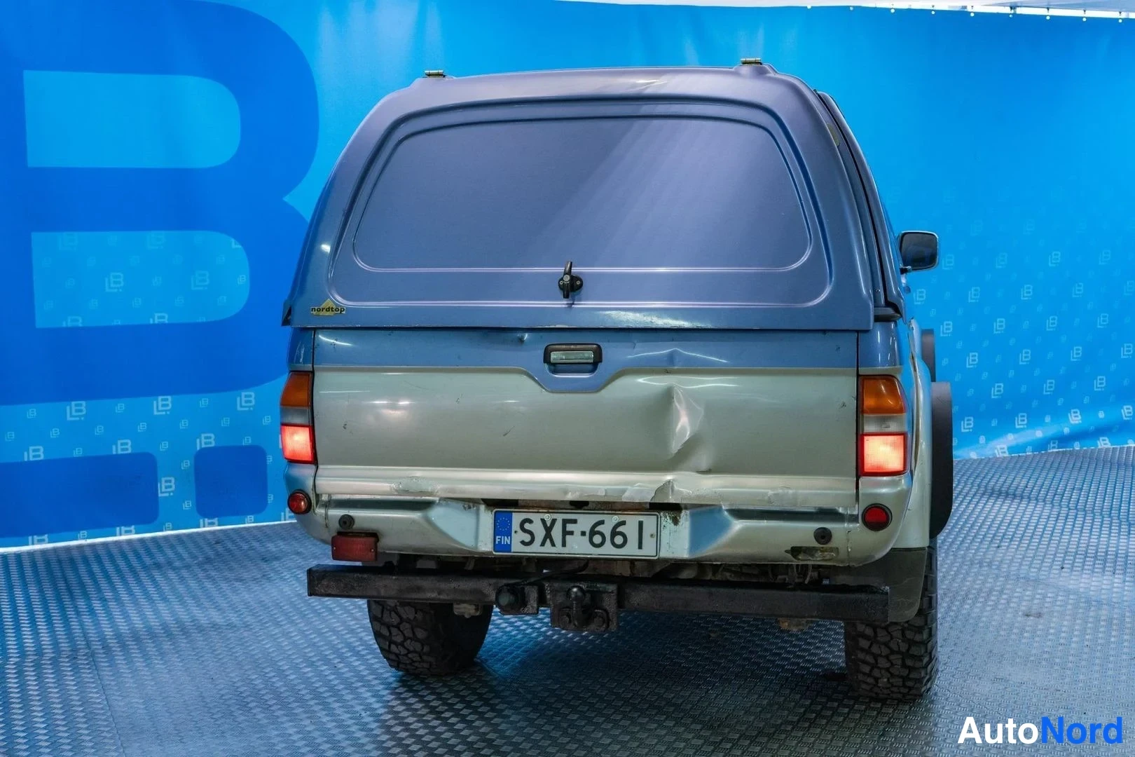 Sininen Mitsubishi L200 1999, takaa, kuva 6