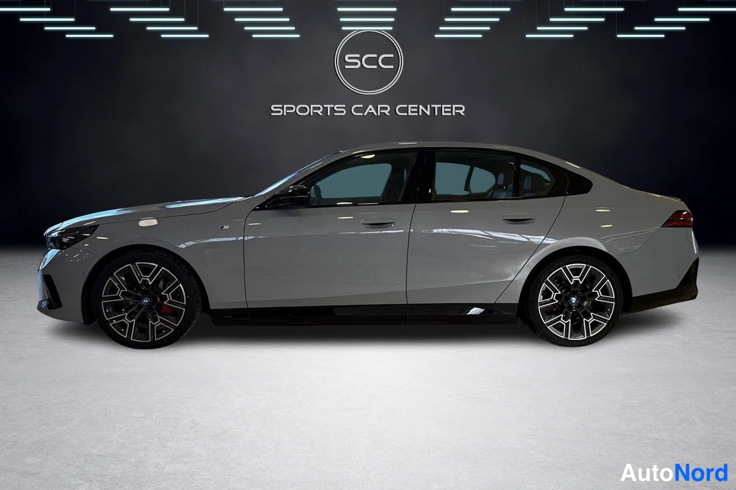 Grey BMW i5 2024, side, photo 3