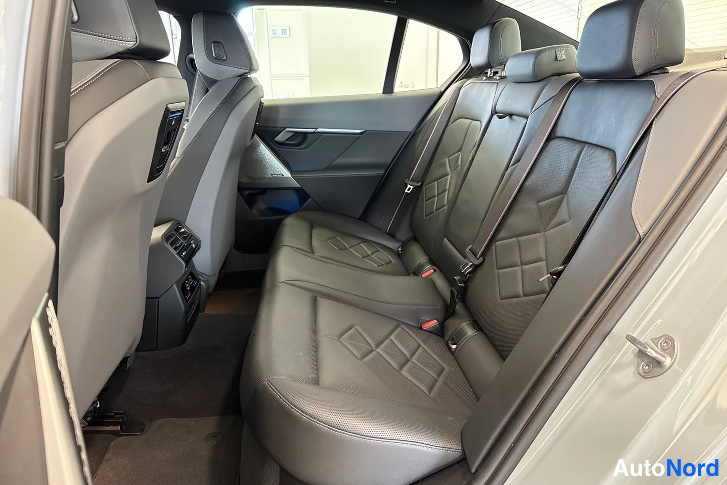 Grey BMW i5 2024, rear seats, photo 12