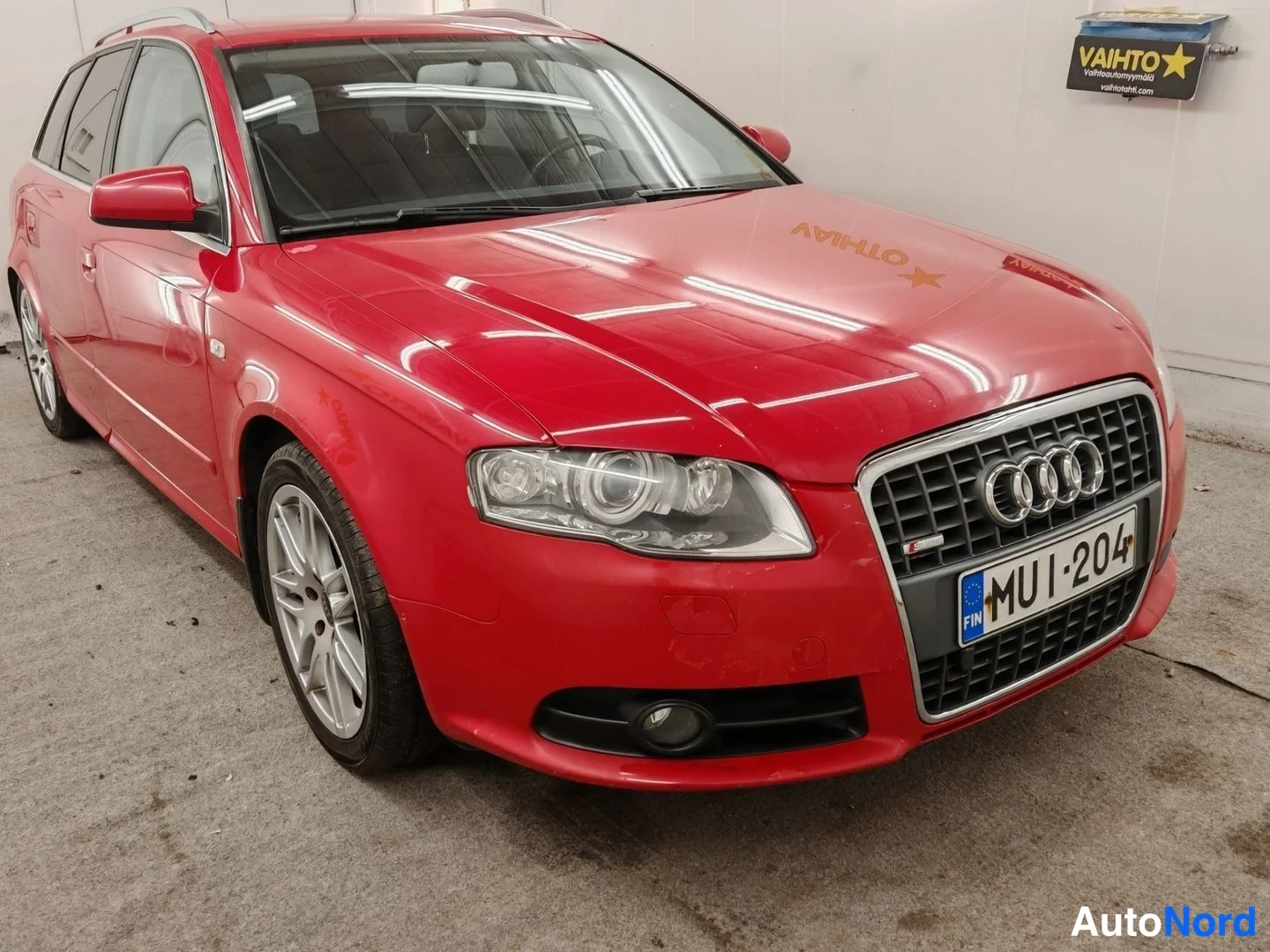 Punainen Audi A4 Avant 2007, etuviisto, keula oikealle, kuva 2