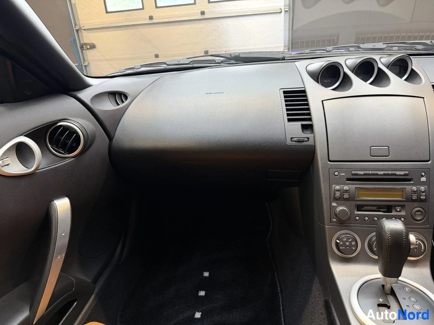 Lila Nissan 350Z 2003, förarplats, bild 13