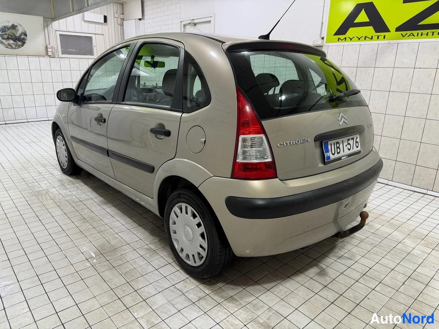 Beige Citroen C3 2009, rear three-quarter, photo 9