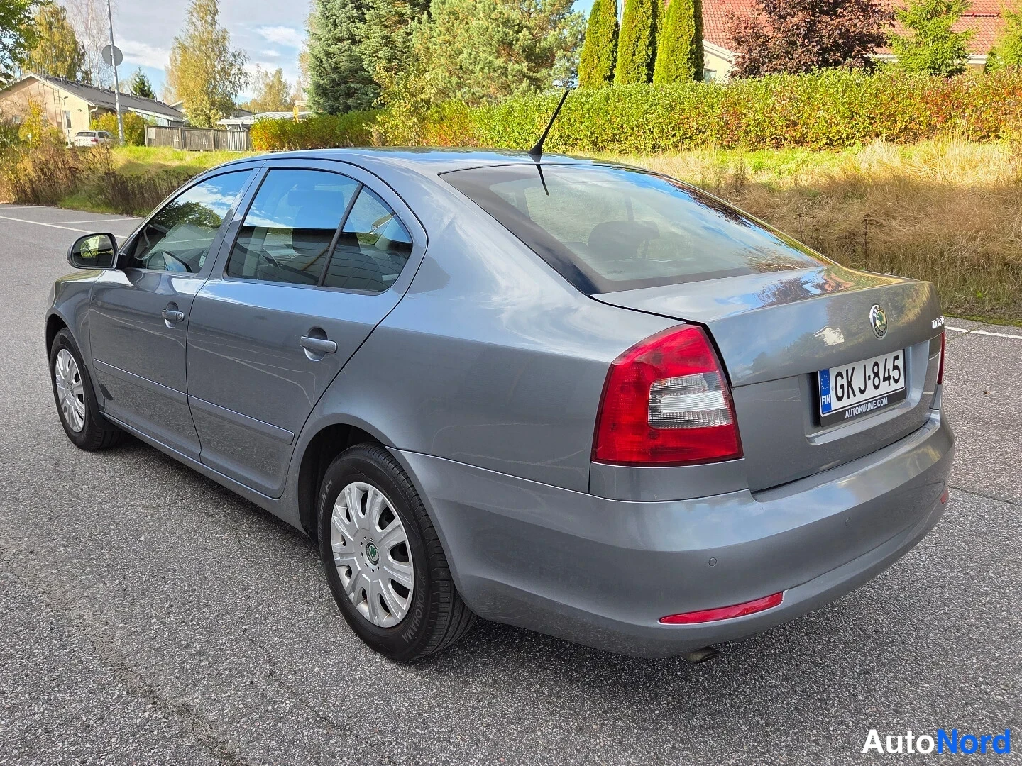Harmaa Skoda Octavia 2012, takaviisto, kuva 6