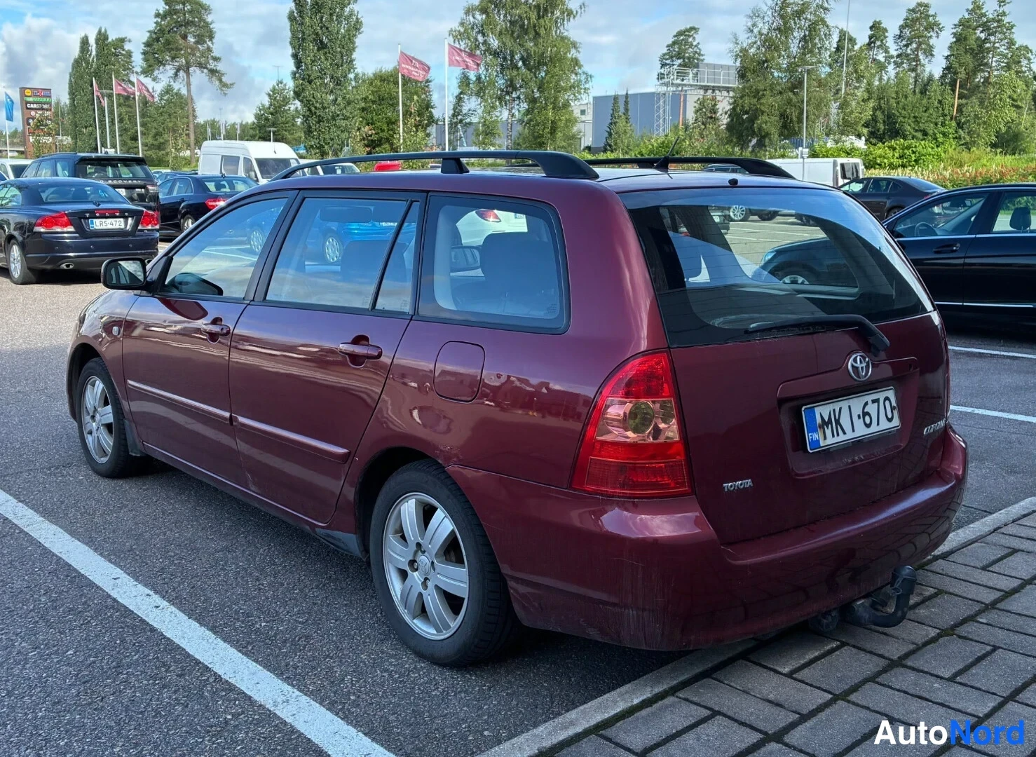 Punainen Toyota Corolla 2007, takaviisto, kuva 3
