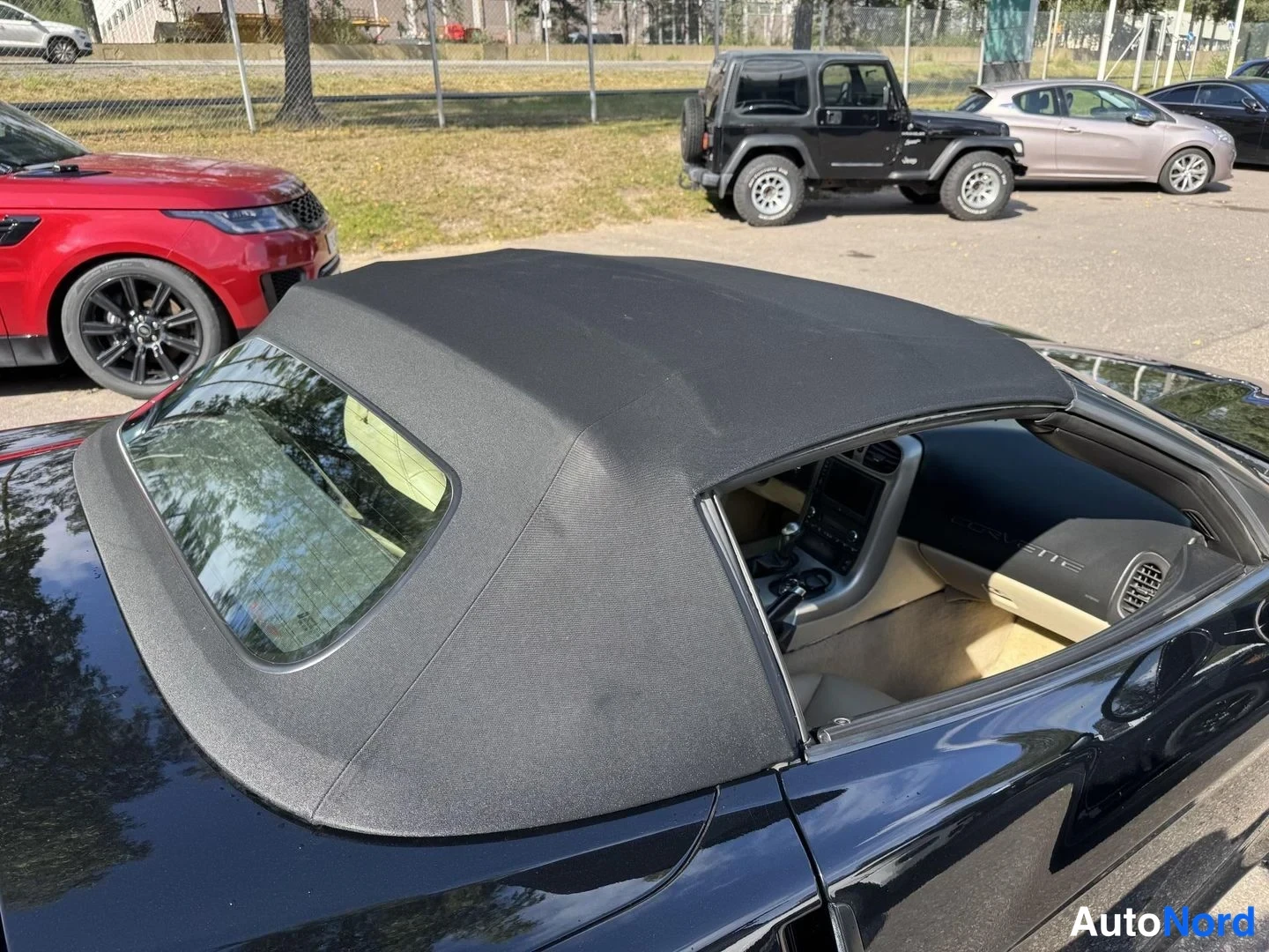 Musta Chevrolet Corvette C6 2005, sivulta, kuva 6