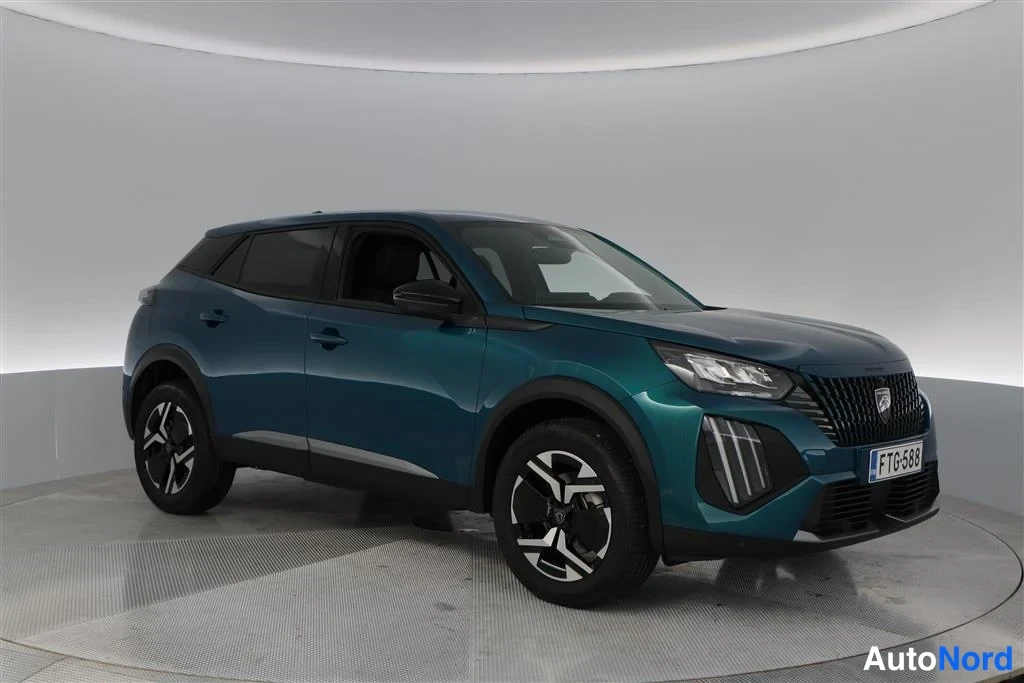Blue Peugeot 2008 2026, front three-quarter, nose to the right, photo 3