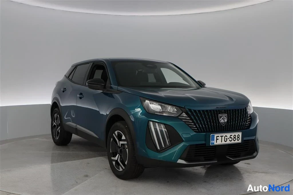 Blue Peugeot 2008 2026, front three-quarter, nose to the right, photo 4