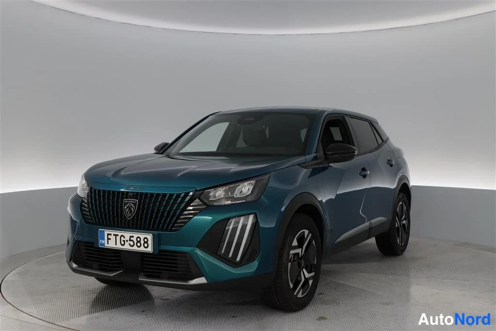 Blue Peugeot 2008 2026, front three-quarter, nose to the left, photo 2