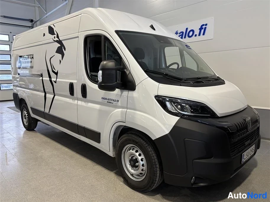 White Peugeot Boxer 2026, front three-quarter, nose to the right, photo 2