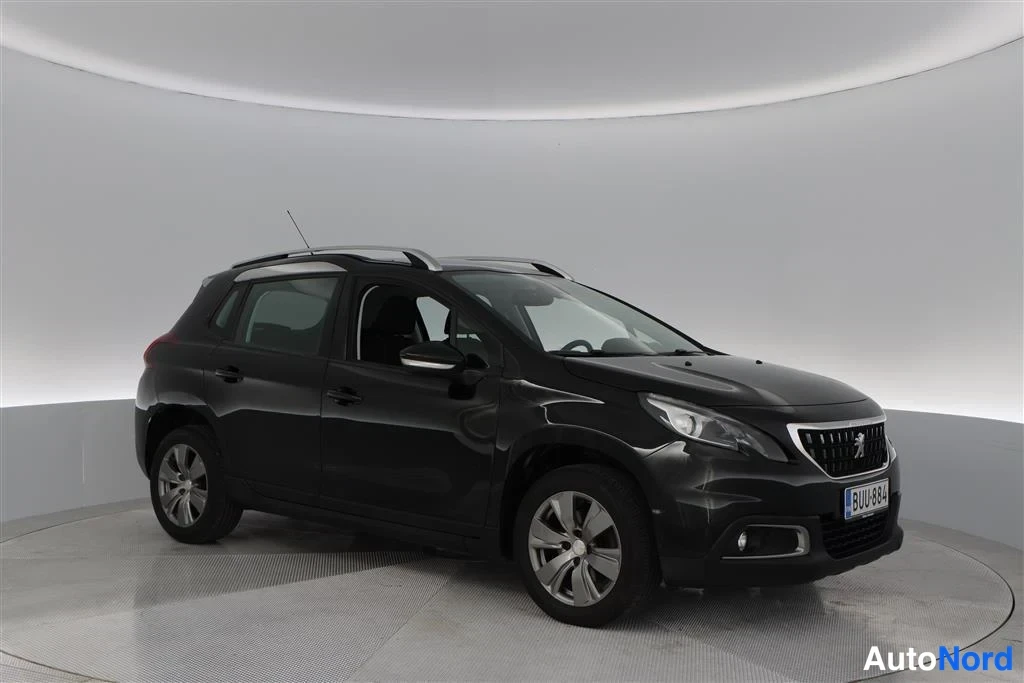 Black Peugeot 2008 2017, front three-quarter, nose to the right, photo 3