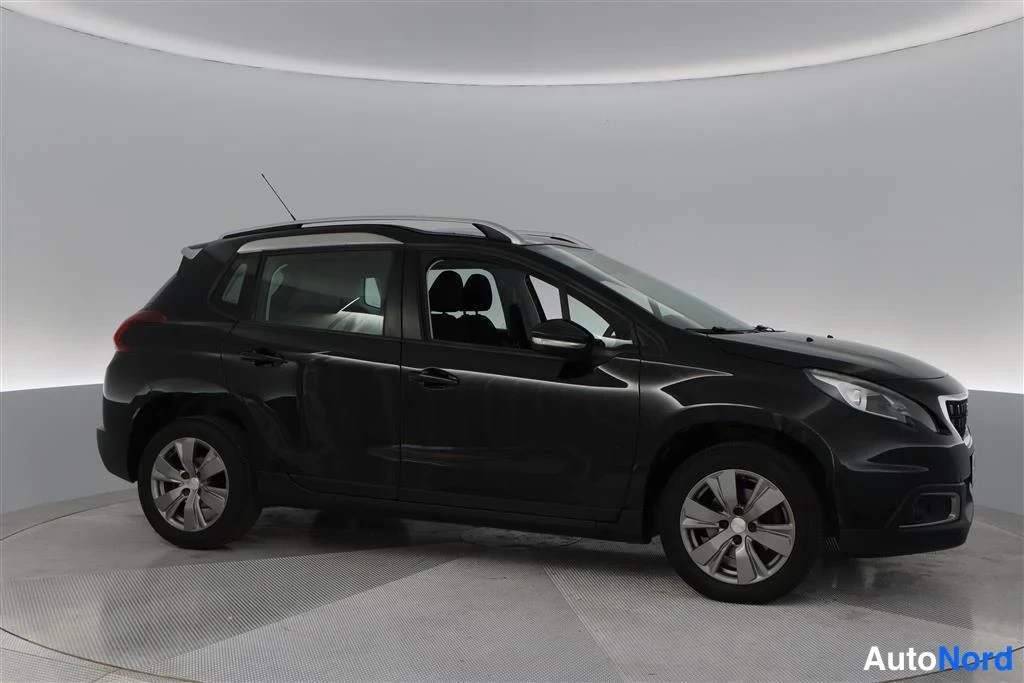 Black Peugeot 2008 2017, front three-quarter, nose to the right, photo 5