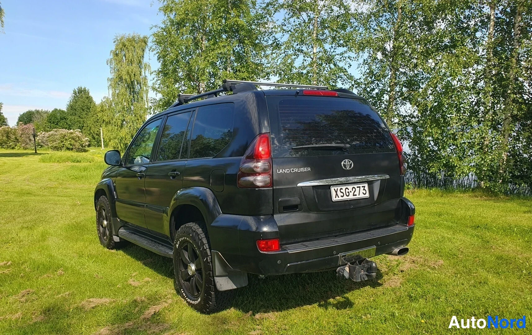 Musta Toyota Land Cruiser 2005, takaviisto, kuva 9