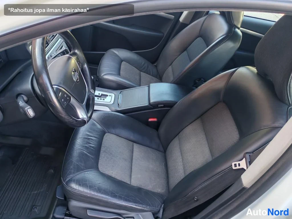 Valkoinen Volvo V70 2011, etuistuimet, kuva 14