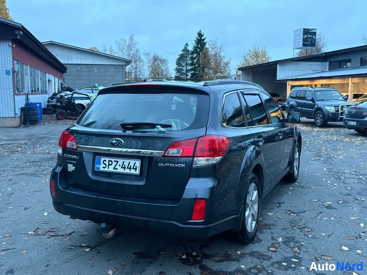 Musta Subaru Outback 2010, takaviisto, kuva 7