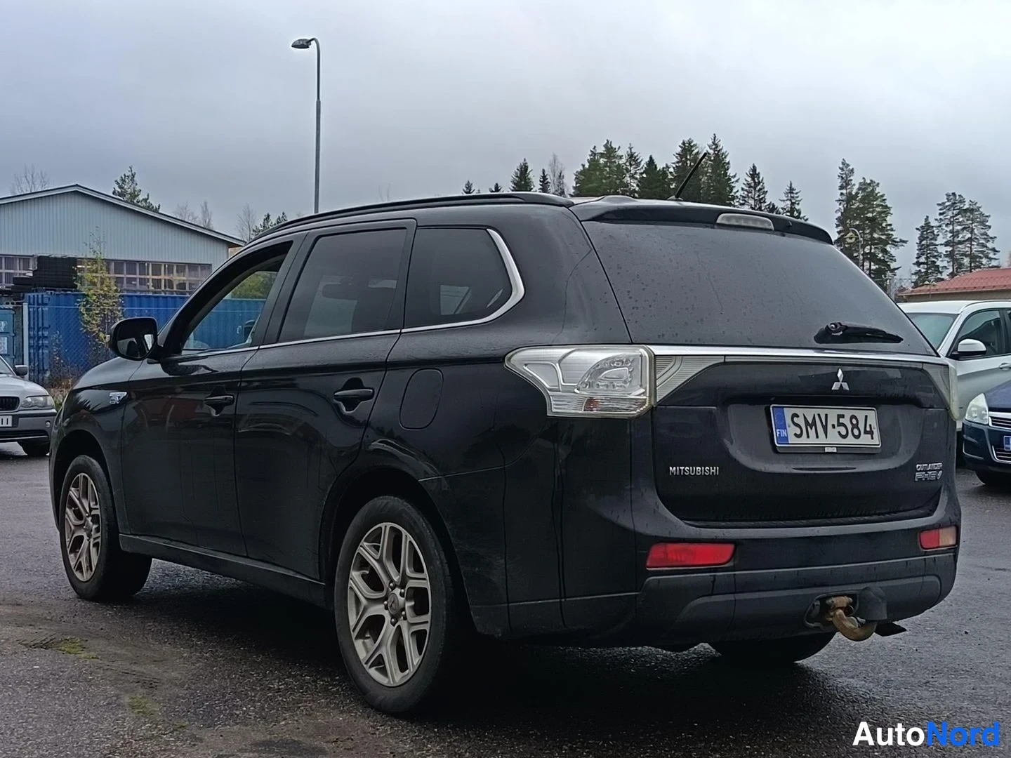 Musta Mitsubishi Outlander PHEV 2013, takaviisto, kuva 7